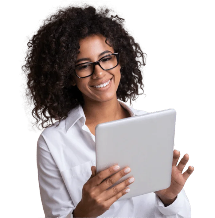 Smiling young businesswoman looking at her tablet